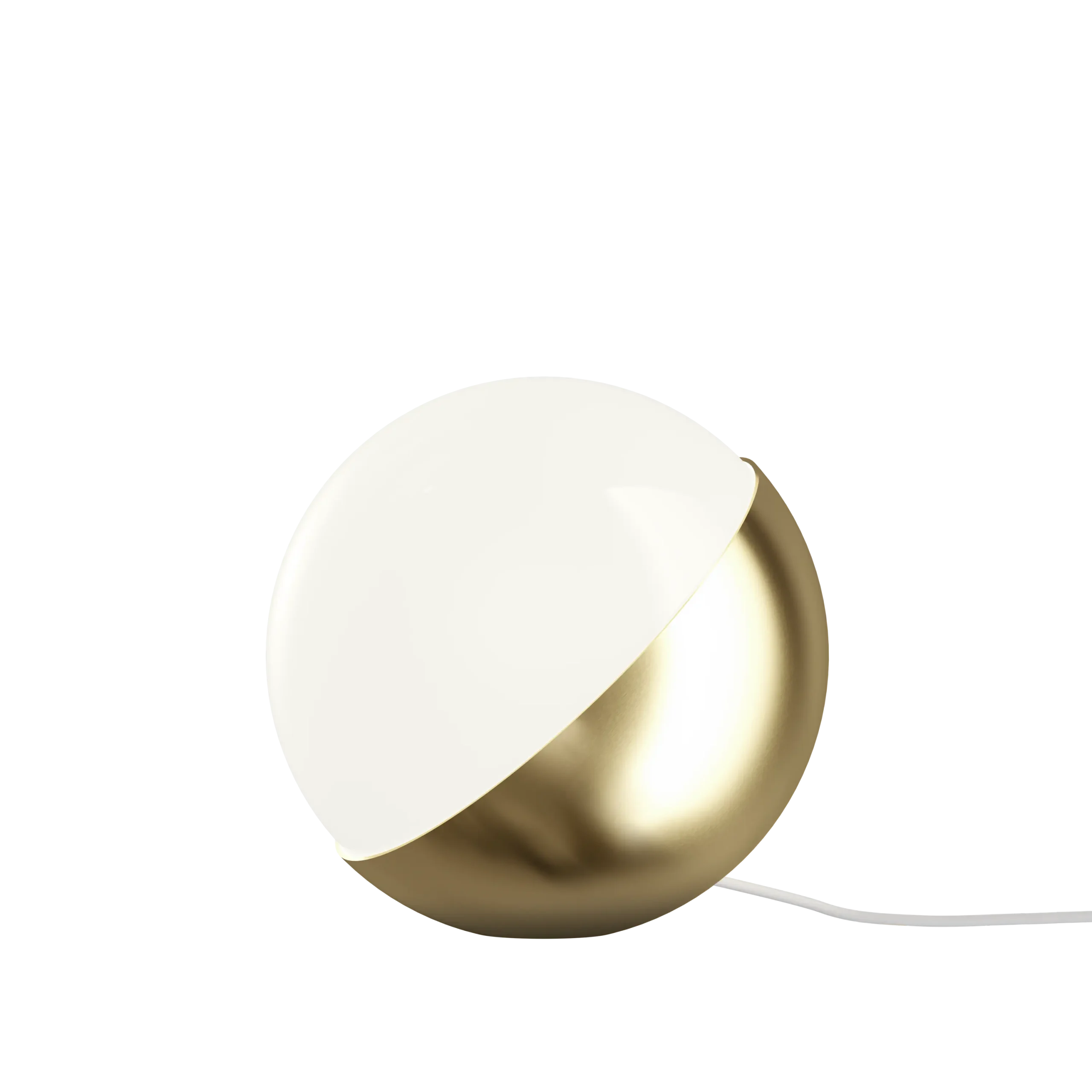 Louis Poulsen VL Studio table lamp in brass with a pivoting cream half shell shade, spherical body resting directly on the surface, three quarter view.