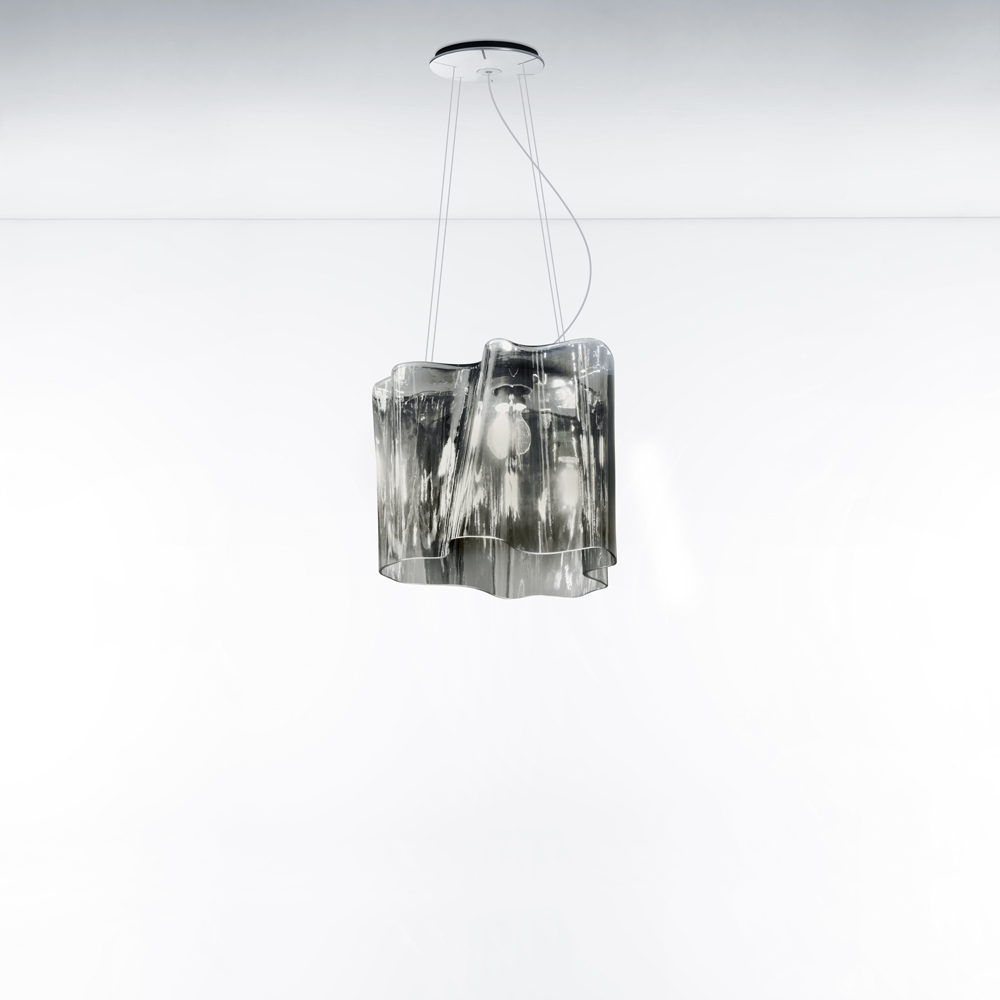 Artemide Logico suspension lamp with a transparent blown glass shade in the signature pinched and folded sculptural form, three quarter view.