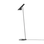 Louis Poulsen AJ floor lamp in black, angled metal shade on a slim stem rising from a flat circular base with a teardrop cutout, full length view.
