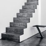 Desalto Element side table beside a concrete staircase