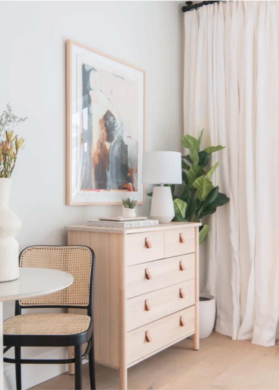 Ton 811 chair beside a dresser