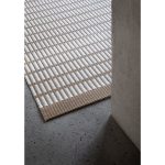 Woodnotes paper yarn area rug shown on floor