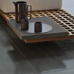 Minotti Quadrado low coffee table styled with tray and pitcher